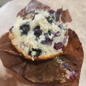 Opened up blueberry muffin closeup