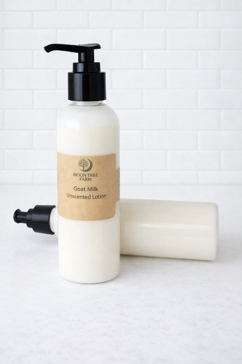 Moon Tree Farm Goat Milk Unscented Lotion in clear pump bottle with kraft label on clean white background