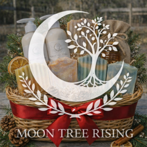 Moon Tree Rising LLC $100 Holiday Gift Basket featuring handcrafted goat milk soaps, lotion, and seasonal farm goods with centered logo overlay.