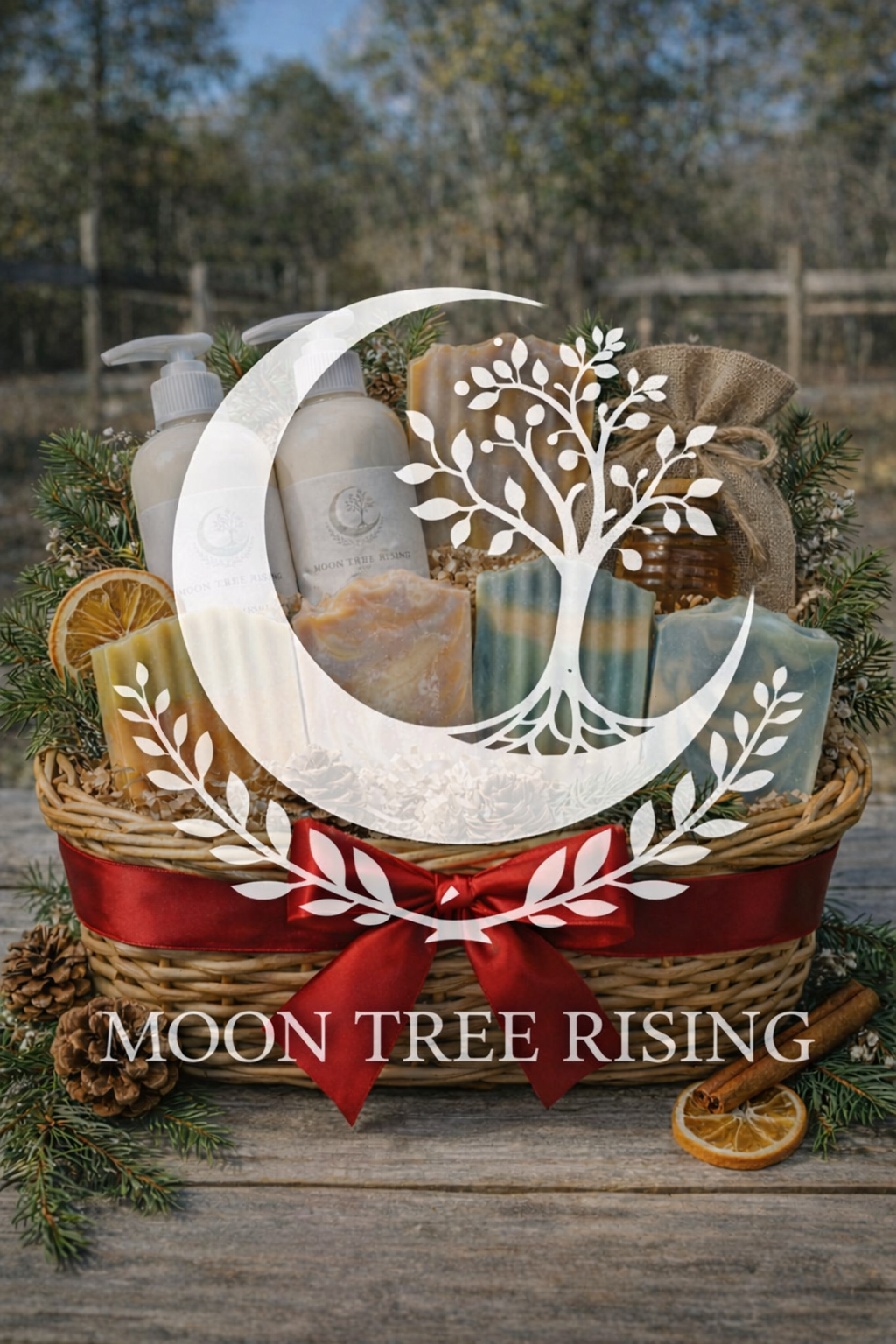 Moon Tree Rising LLC $100 Holiday Gift Basket featuring handcrafted goat milk soaps, lotion, and seasonal farm goods with centered logo overlay.